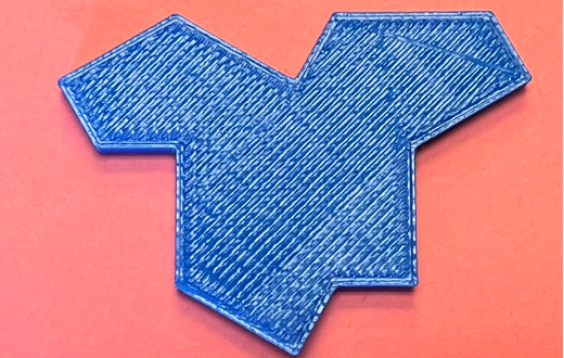 A picture of a 3D printed new math shape the Einstein