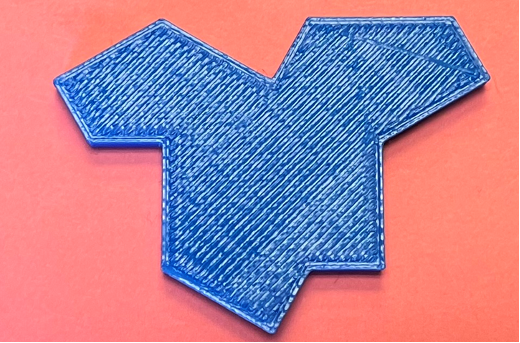 A picture of a 3D printed new math shape the Einstein