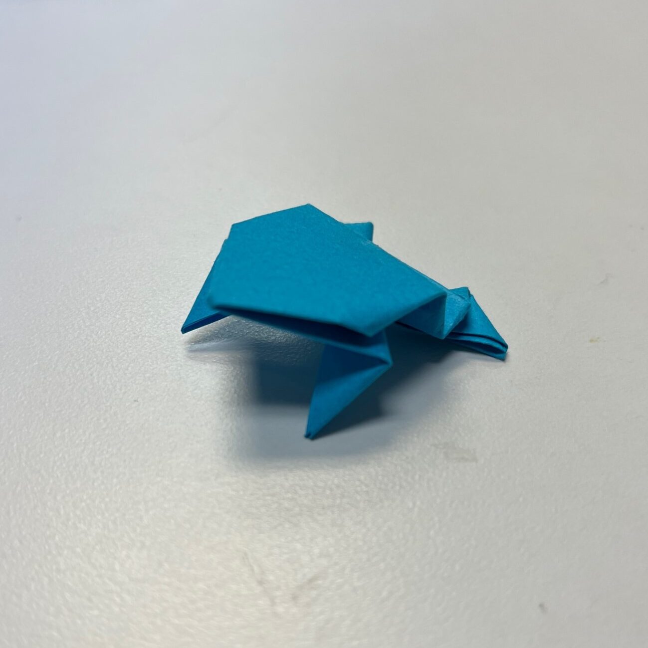 blue origami frog